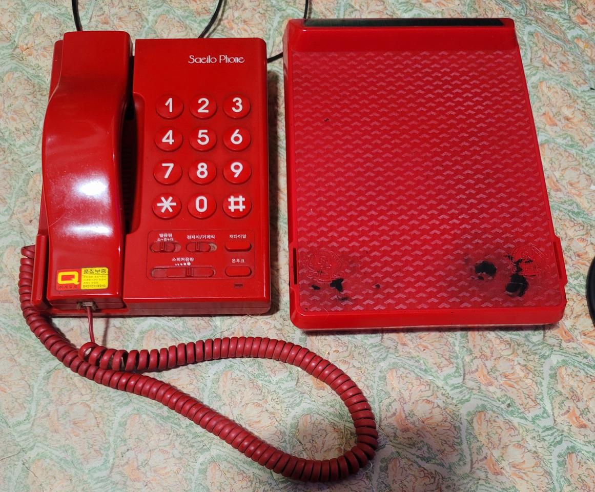 주식회사(세일로) 빨강색전자식 전화기 입니다.