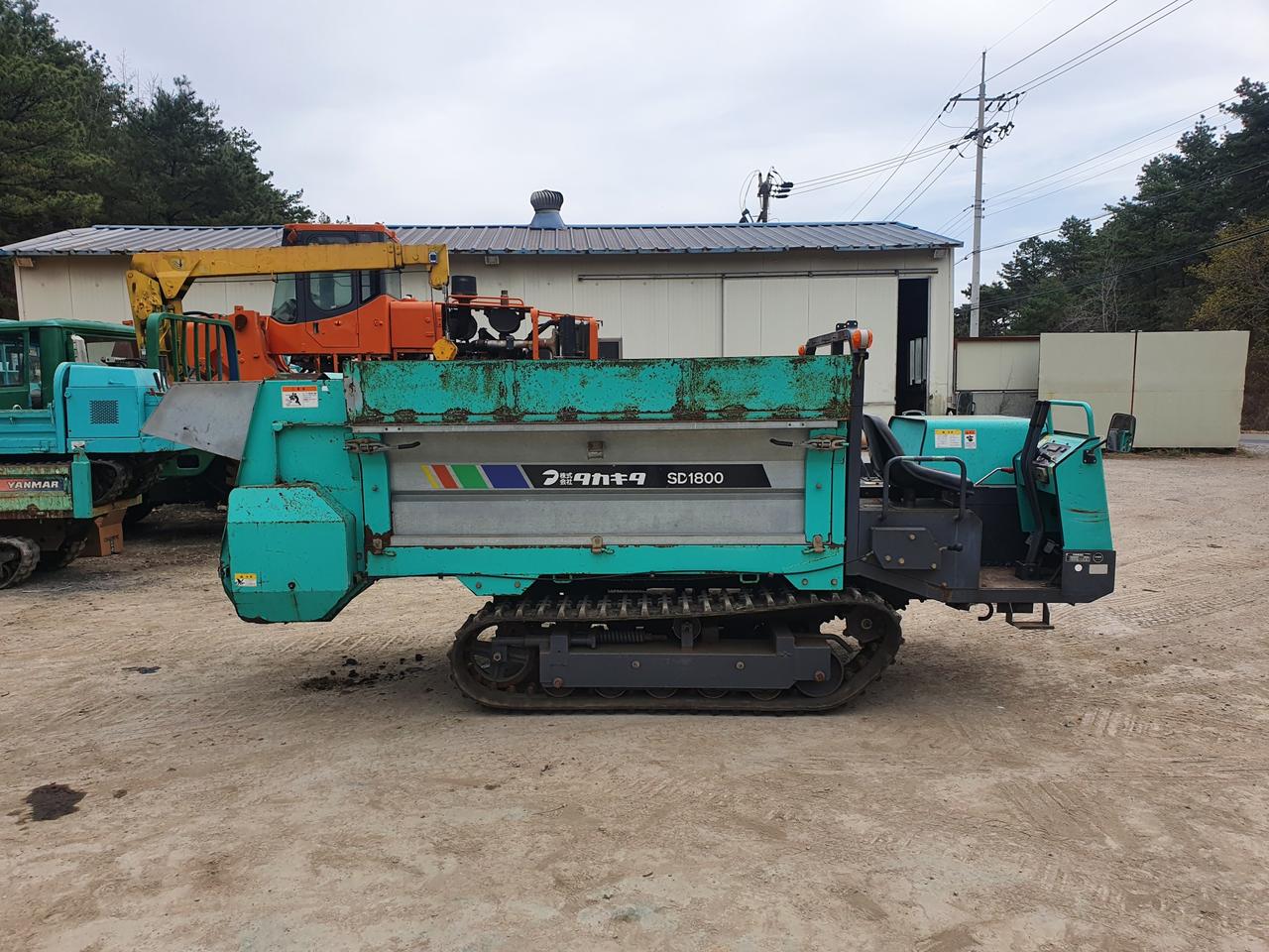 궤도형퇴비살포기