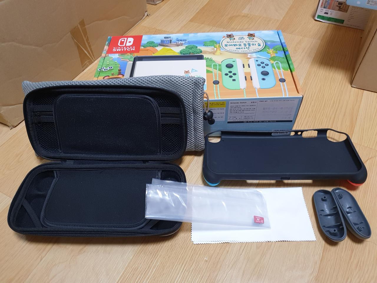닌텐도 스위치 동숲 에디션 팝니다.(박스풀셋+악세사리 및 125기가 메모