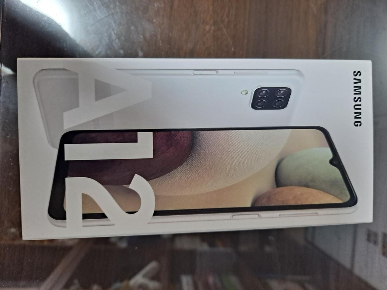 갤럭시 A12 화이트 미사용 풀박스 정상해지 무상AS가능