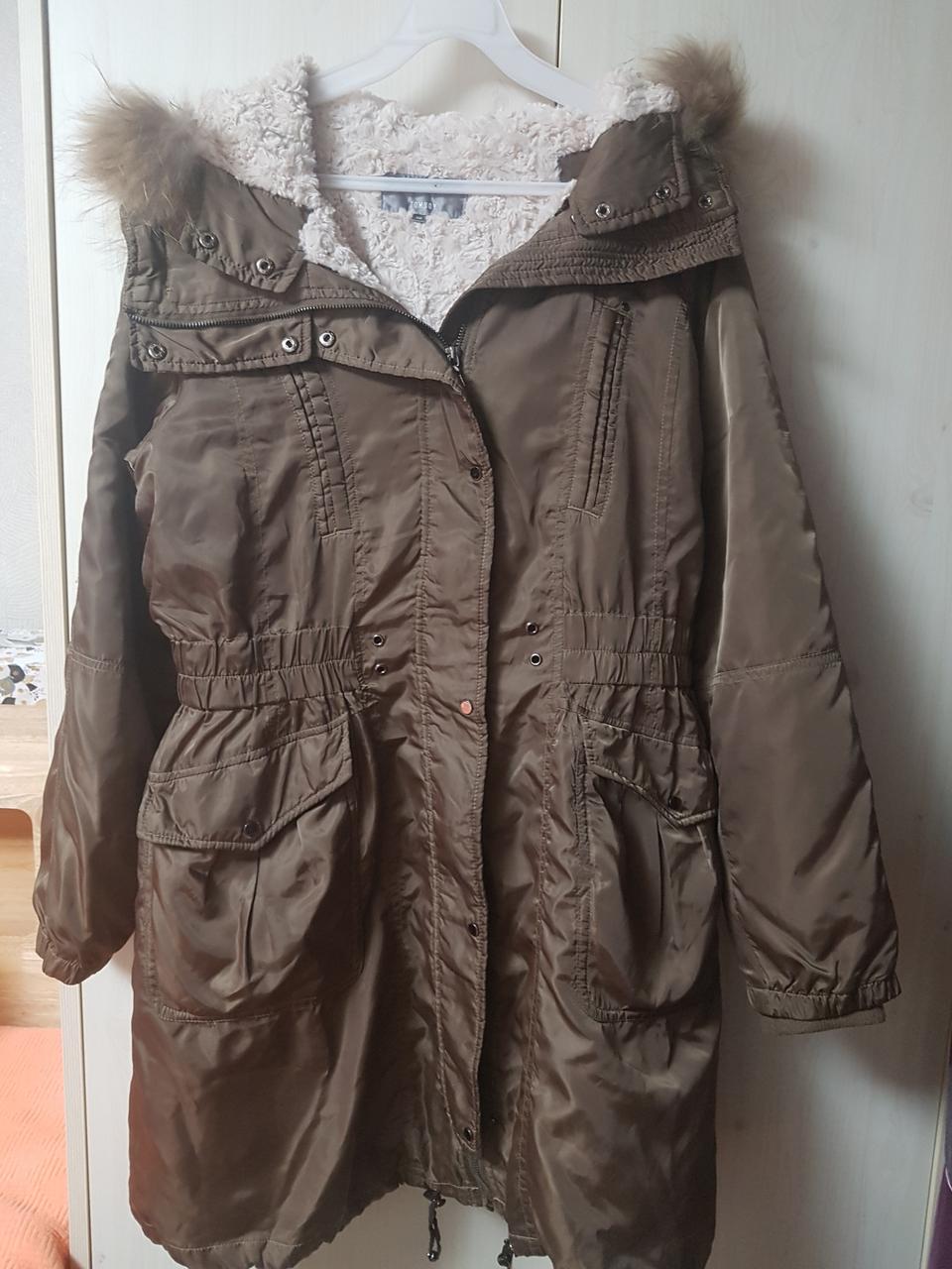 톰보이 라쿤털 패딩 66