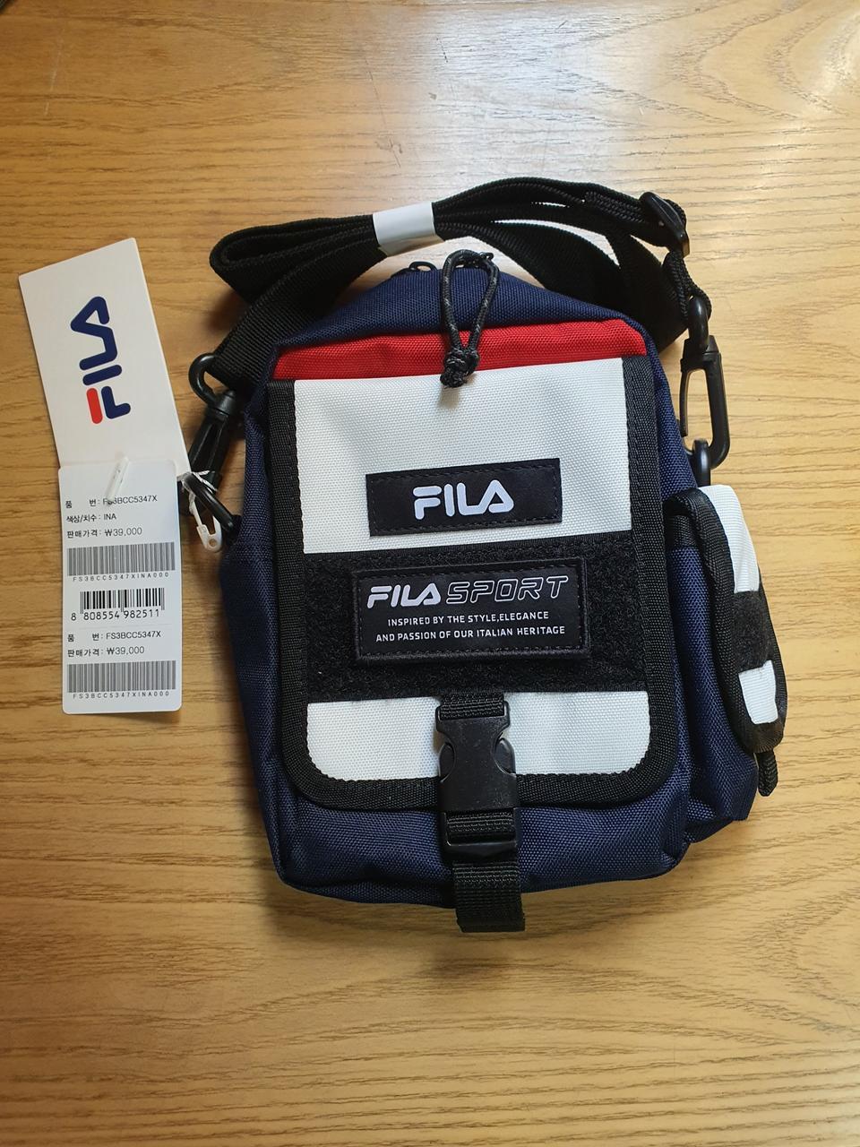 휠라 정품 미니크로스백 새거