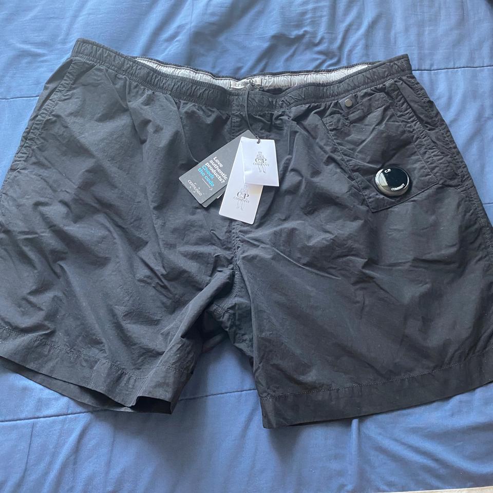 (미사용, 새상품)22SS cp컴퍼니 렌즈 와펜 나일론 비치 숏 스윔팬츠