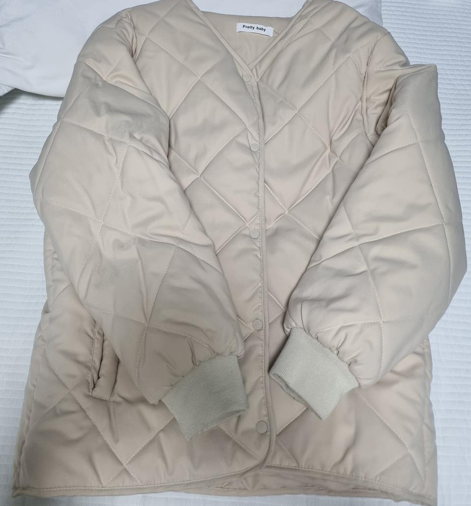 여성패딩 크림색