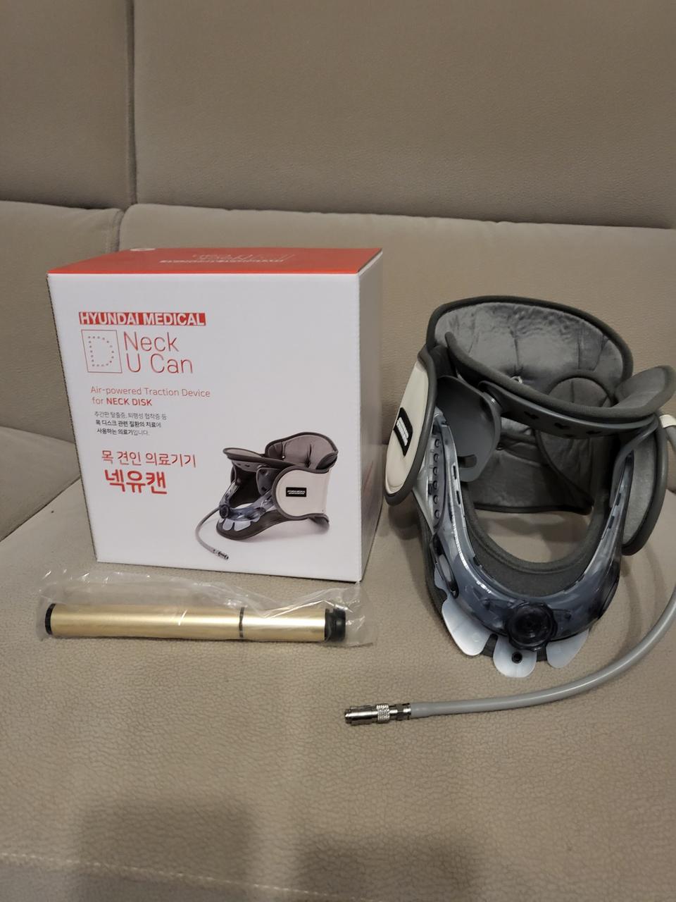 넥유캔목견인기