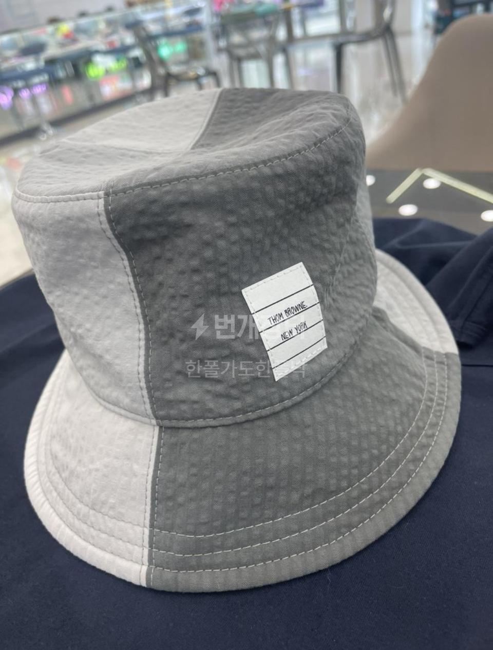 톰브라운 patchwork bucket hat MHC337F08105