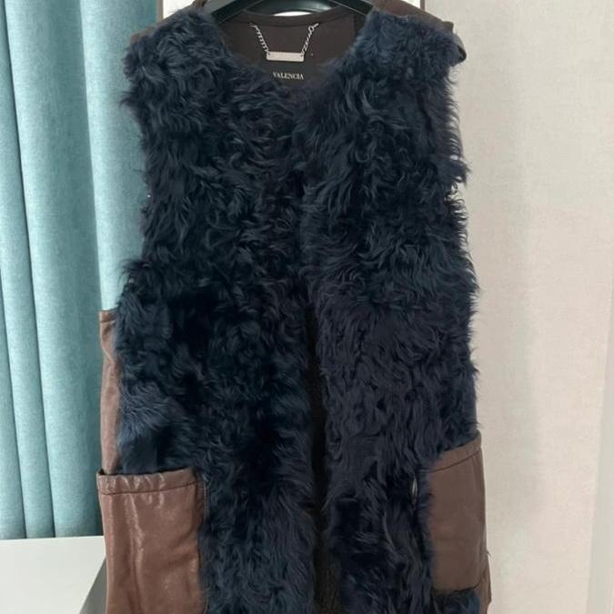 발렌시아 퍼조끼