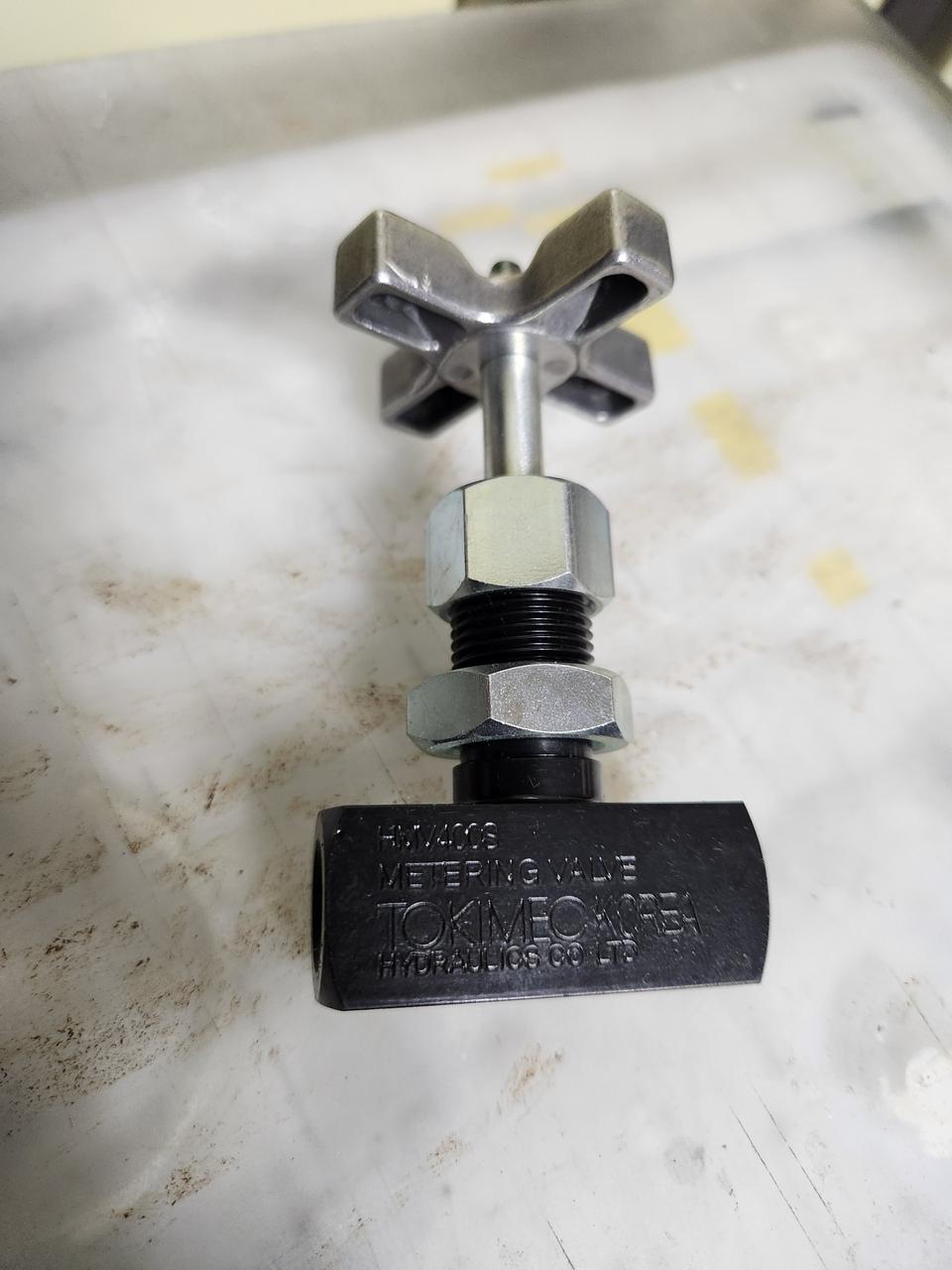 Tokimec metering valve(정량 유압 밸브)