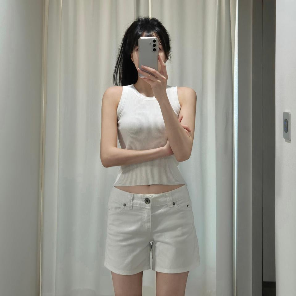 타미힐피거 휘뚜루마뚜루 화이트 면 반바지