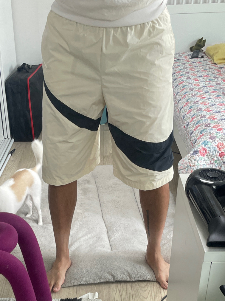 (Nike)나이키 아이보리 7부 우븐팬츠