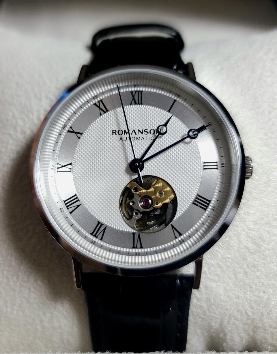 로만손 오픈하트 시계