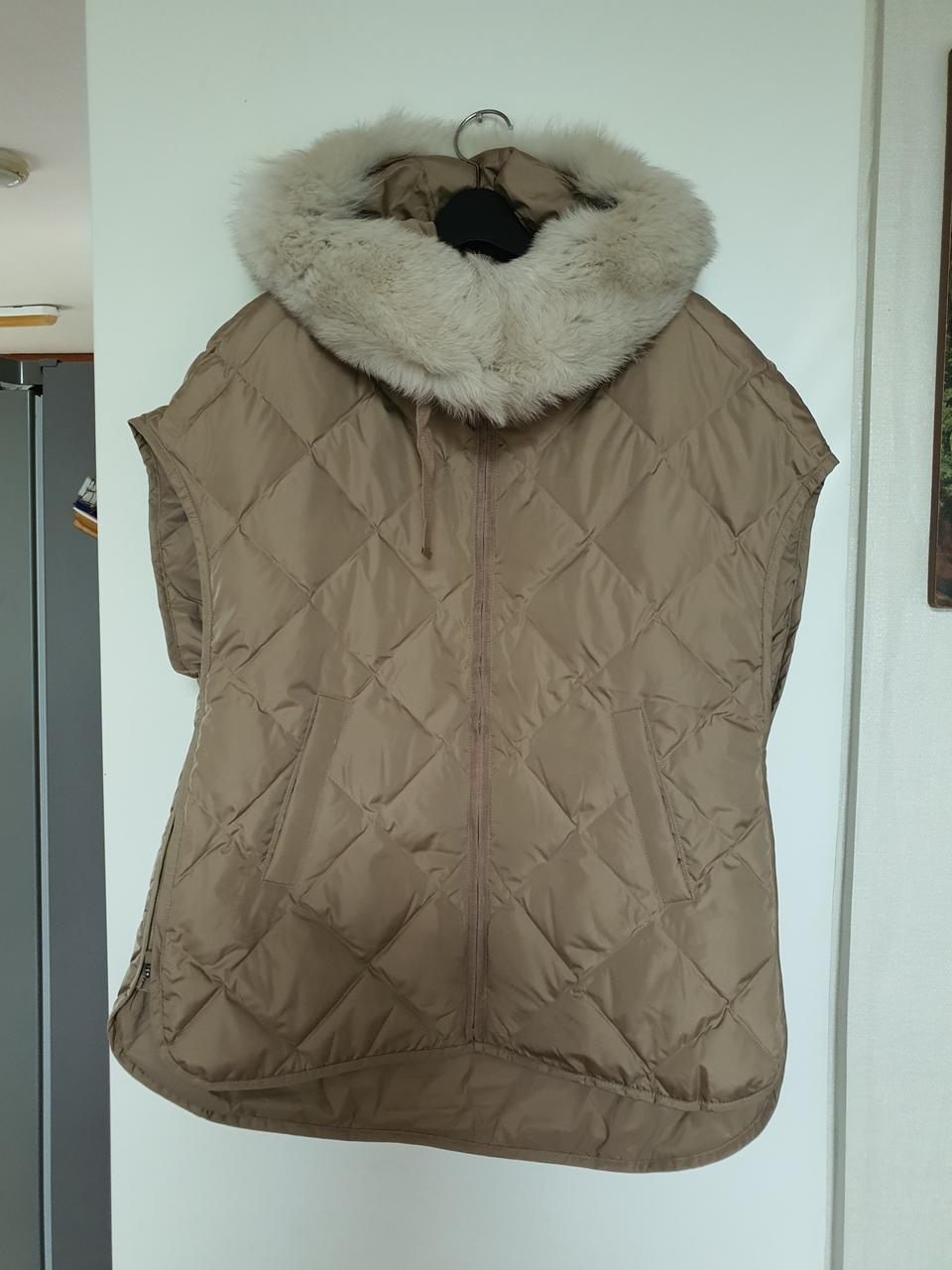 (새상품)sj wani(손정완) 구스패딩 베스트66