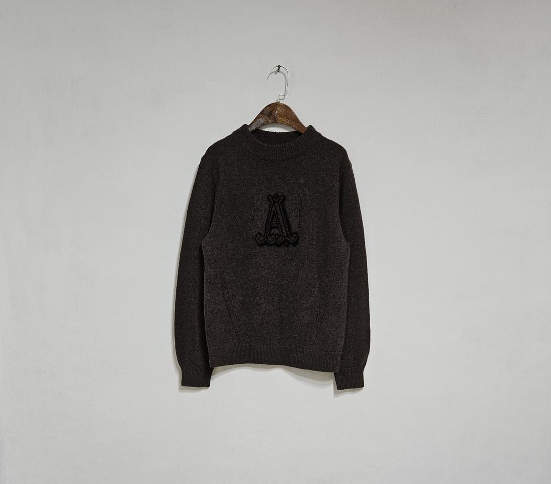 칼라거펠트 양모 니트