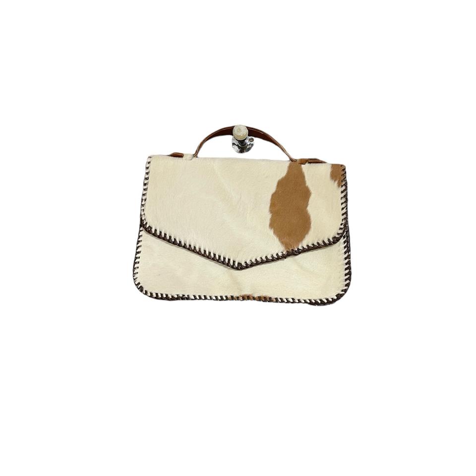Cow pattern ivory handbag