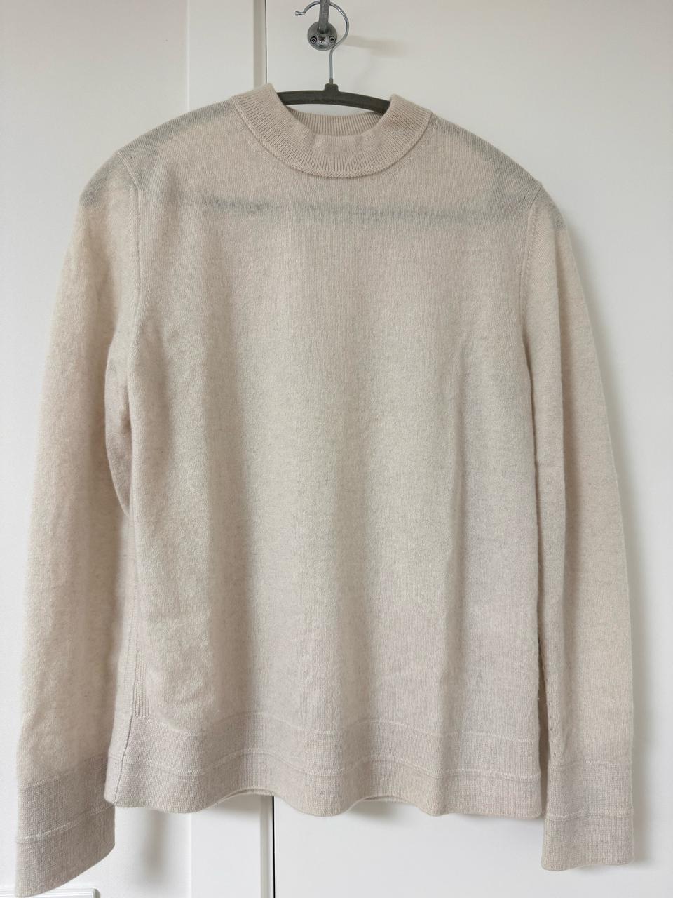 타임 캐시100 모크넥니트