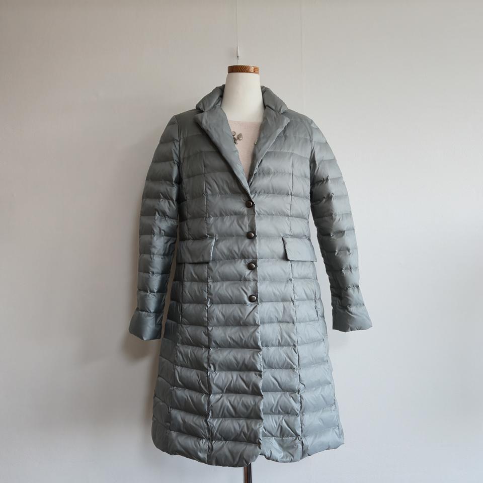 손정완 SJ WANI 구스 경량패딩 66