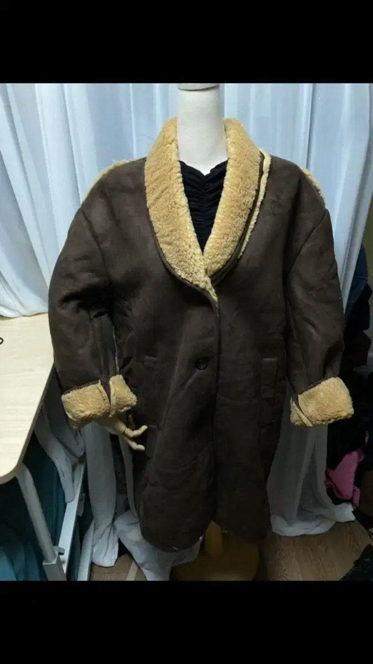 숄카라 스웨이드무스탕