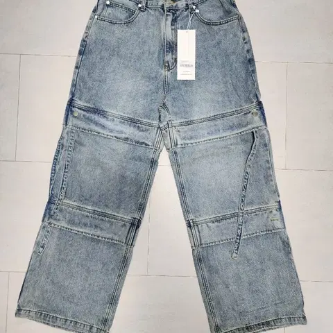 [L] 인템포무드 사이드 스트랩 디테일 데님 팬츠 블루