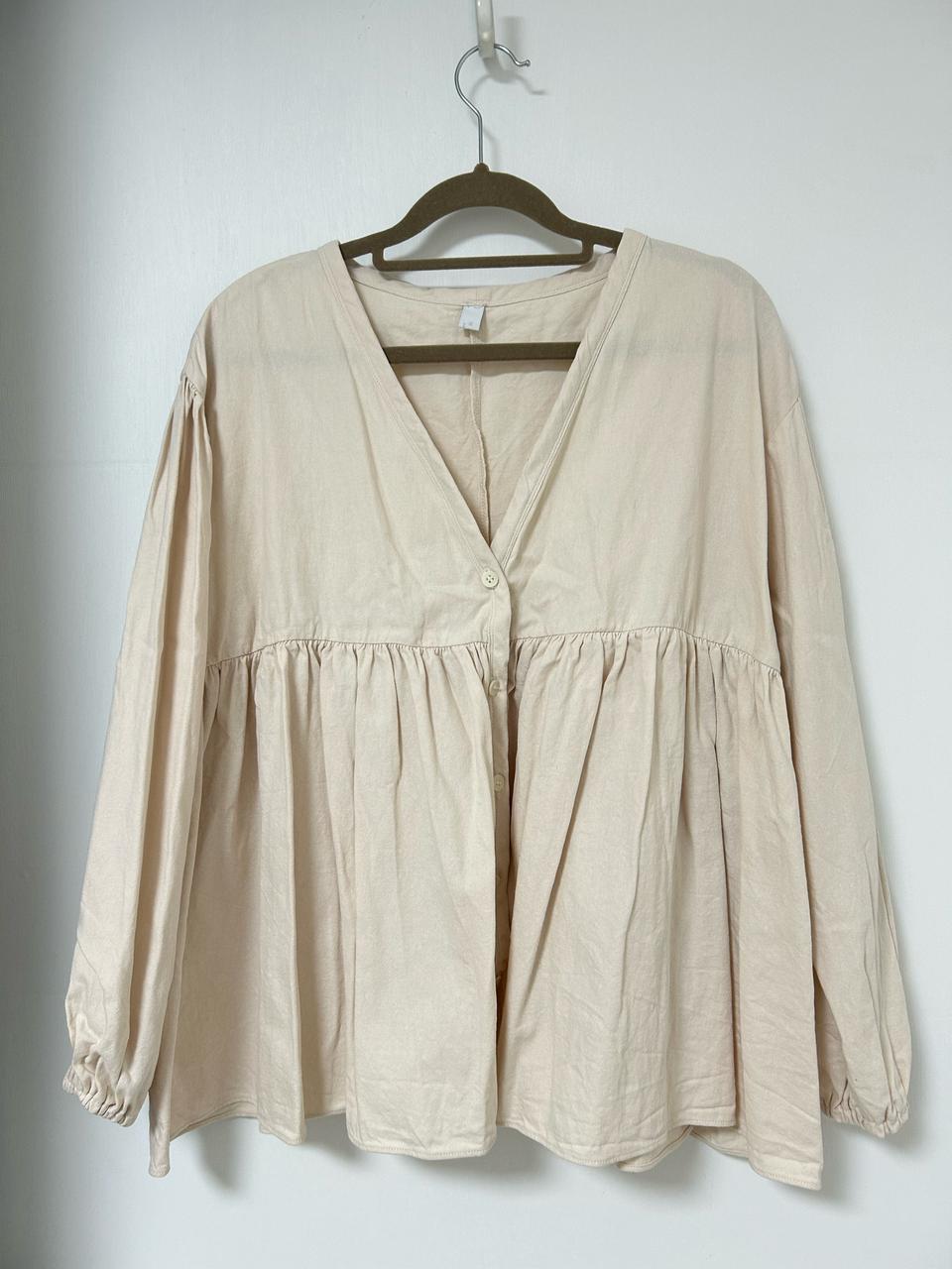 크림 소매밴딩 퍼프 브이넥 면 블라우스