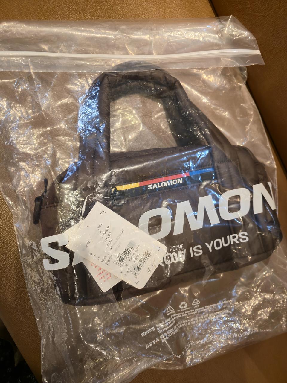 새상품 살로몬 포쉬 패딩백
