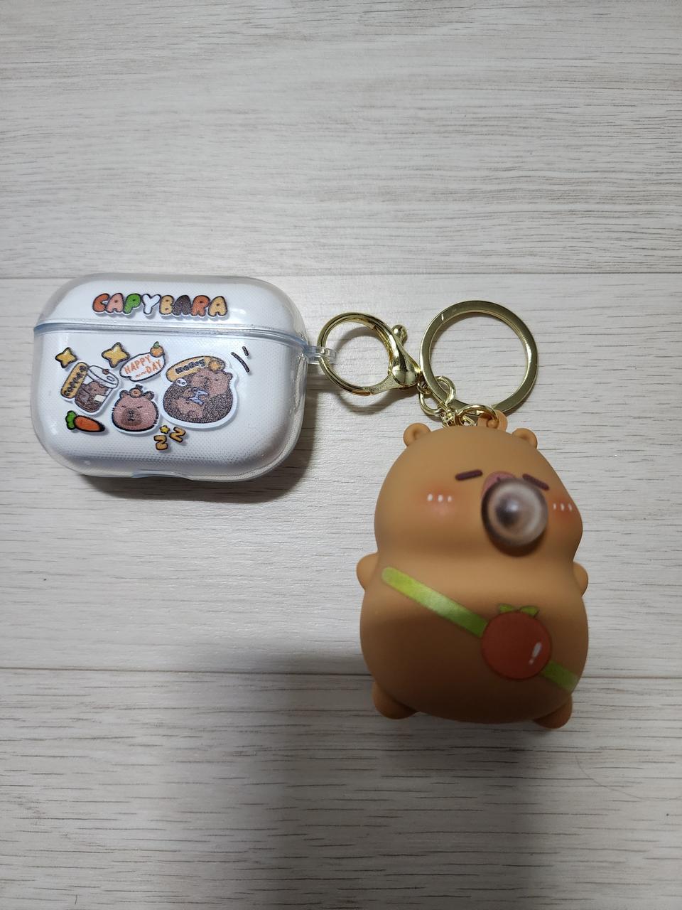 (새상품)카피바라 캡슐토이 폰케이스 세트 팝니다.(이어폰포함)