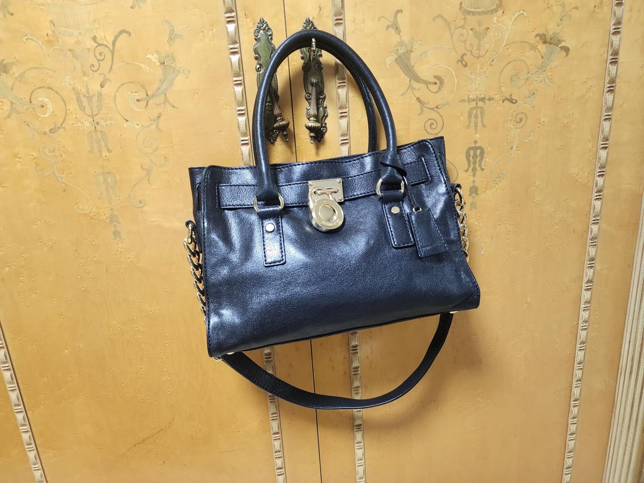 마이클 코어스 블랙 가죽 토트백.새제품