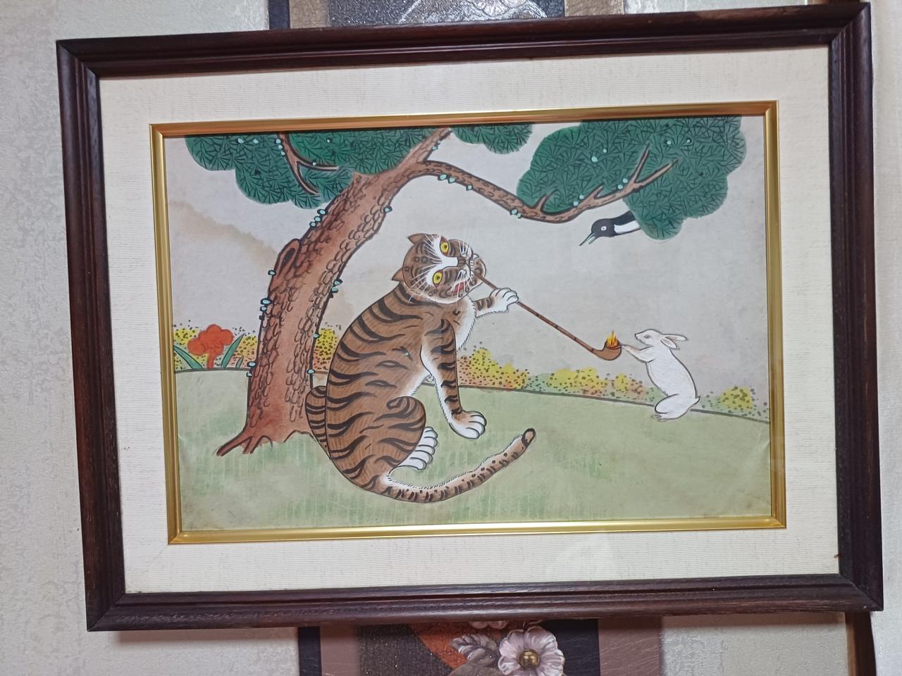 곰방대물고있는 까치와호랑이 토끼