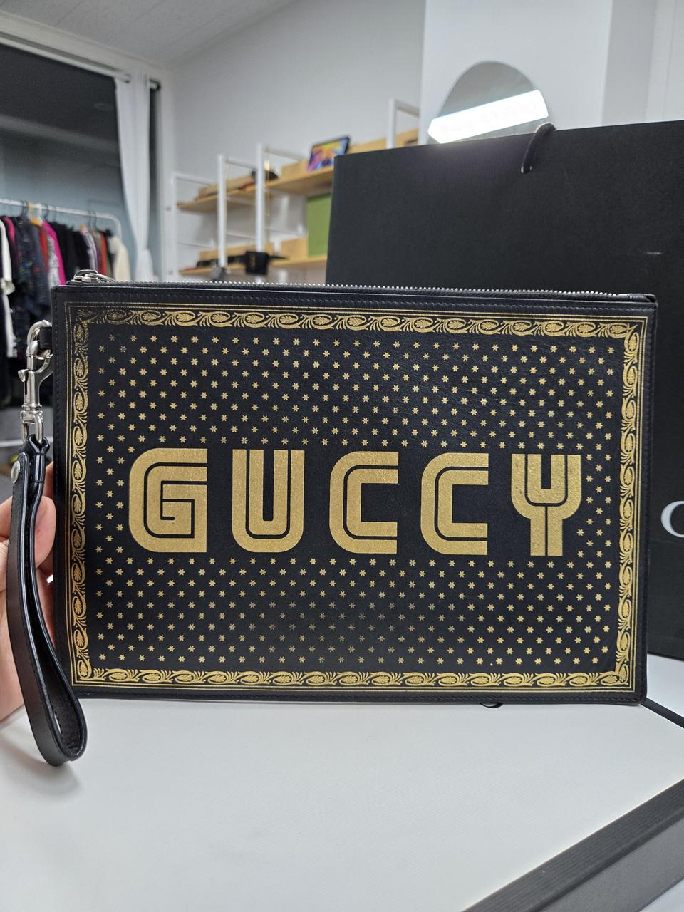 구찌 골드스타 클러치