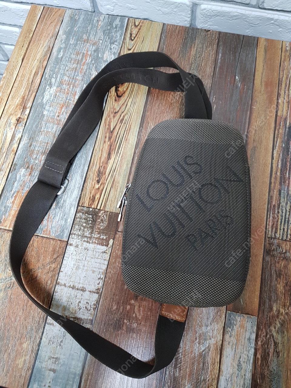 다미에 제앙 아웃도어 슬링백