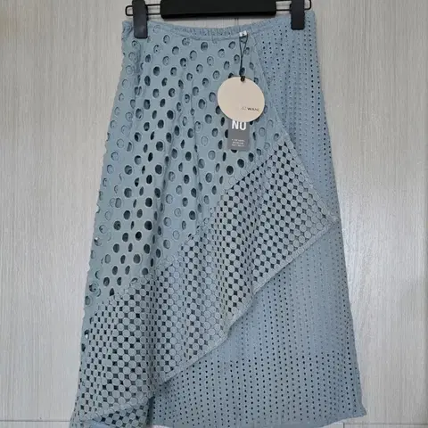 55~보통66)면100/새제품/ SJ WANI 뒷밴딩 펀칭 아일렛 스커트