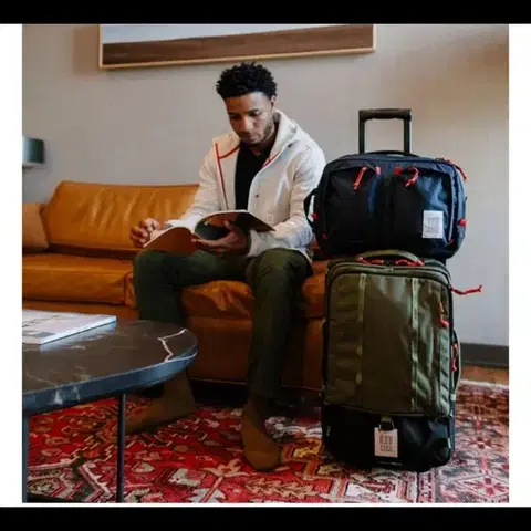 파타고니아 디자이너가 만든 캐리어 토포디자인