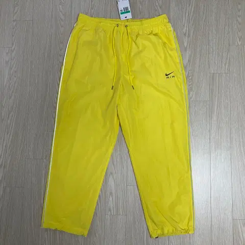 나이키 NSW 리플렉티브 에어 우븐 팬츠