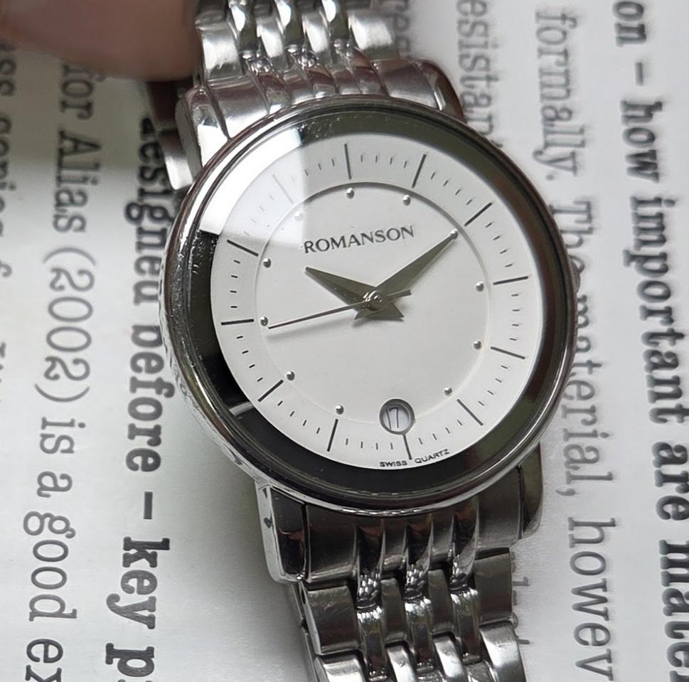 빈티지 로만손 화이트다이얼 칼침핸즈 쿼츠 28mm 여성용