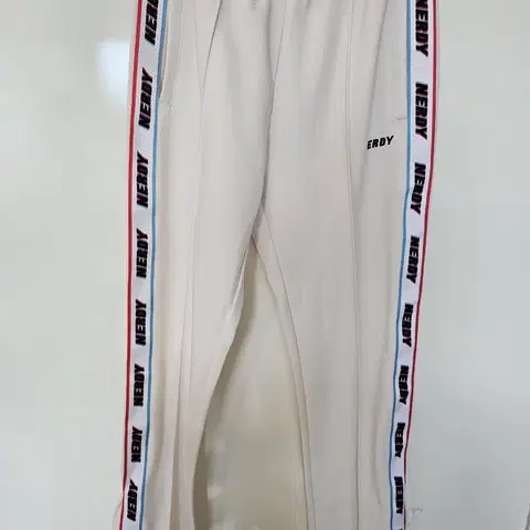 널디 NERDY 라인 트랙 팬츠 아이보리 xs