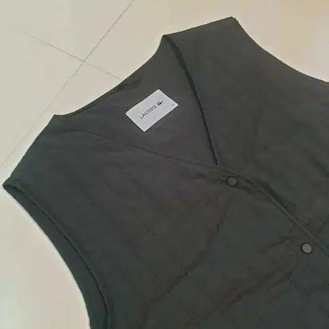 라코스테 여성 누빔 경량 패딩조끼