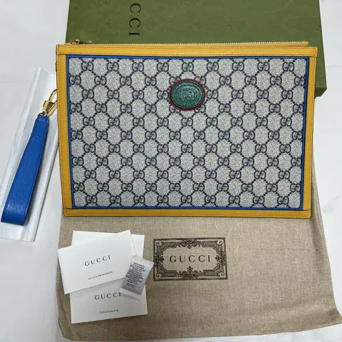 [미사용 새상품] 구찌 인터로킹 GG 클러치 백 672953