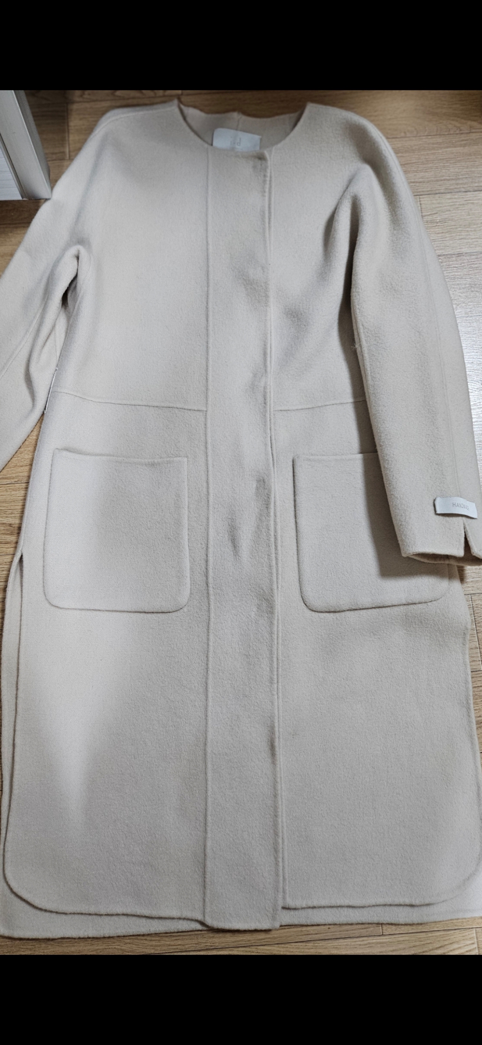 앤유 노카라 아이보리 코트  66