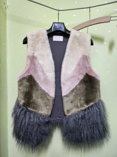 SJSJ양털배색조끼55~66 상태양호 택포29000