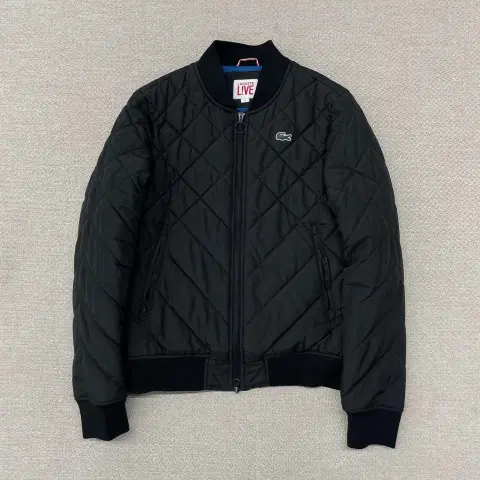 라코스테 퀼팅 블루종 자켓