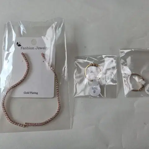 새상품 써지컬 귀걸이 반지2개 일괄