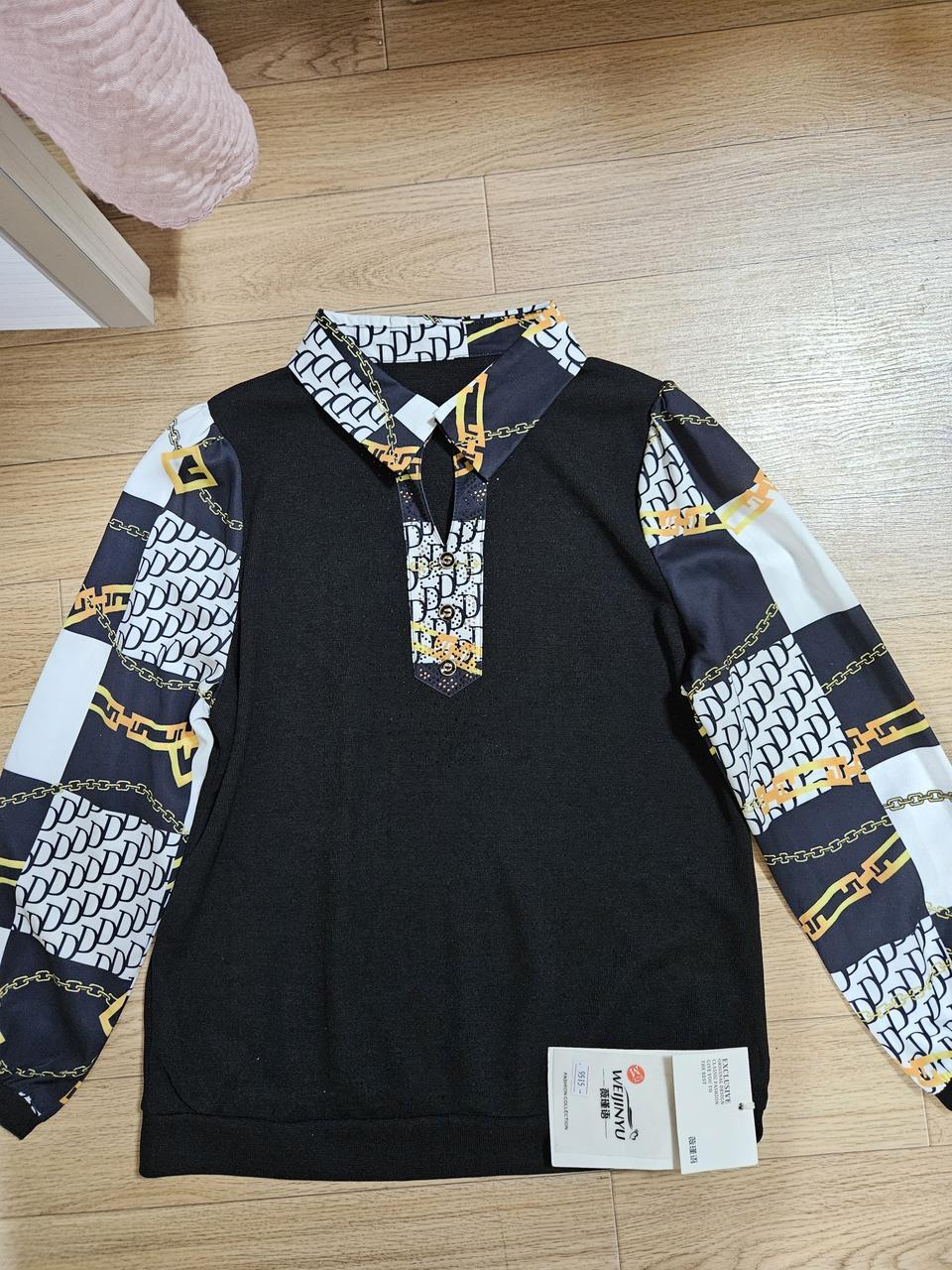 블랙 색상의 패턴 긴팔 티셔츠 새제품. 66