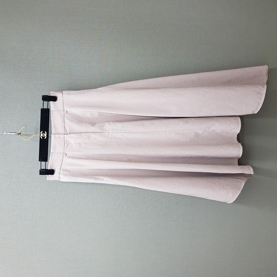 한섬 시스템 2023 언밸런스 헴 백밴딩 스커트 64-94사이즈