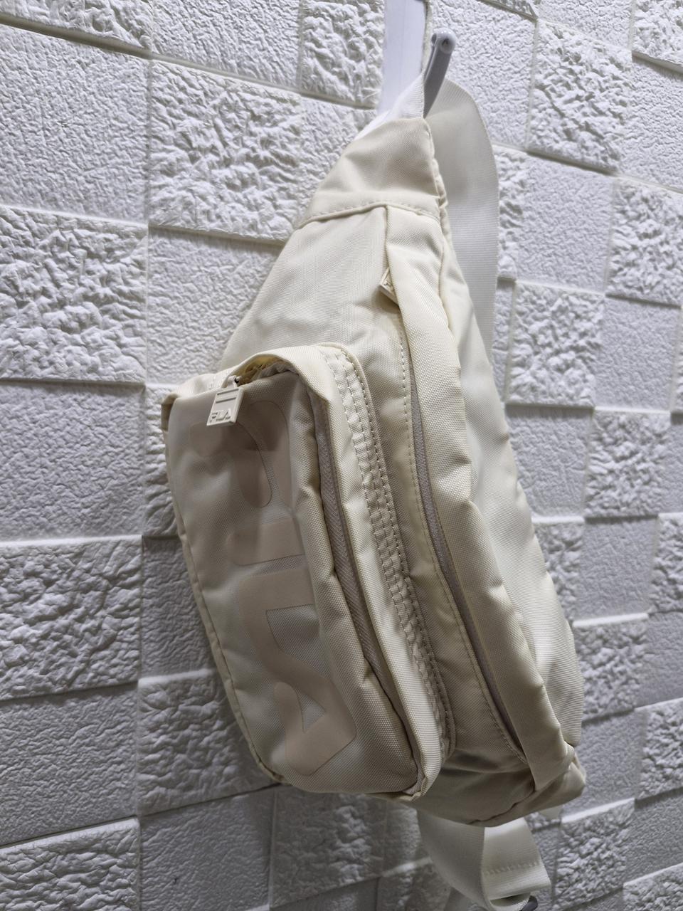 휠라 힙색 (택포)