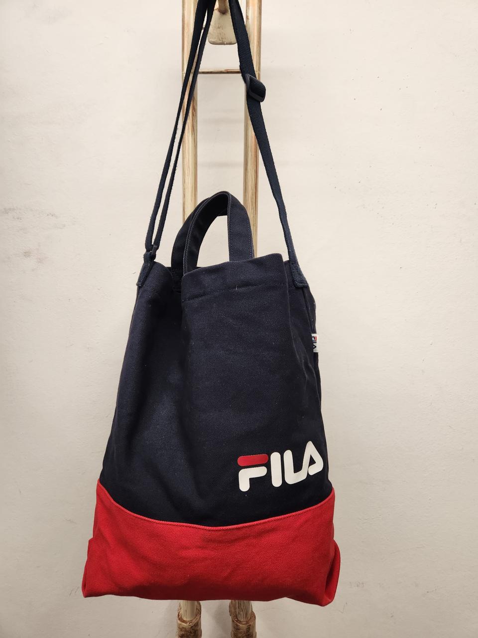 휠라 FILA 네이비/레드 토드겸 크로스백