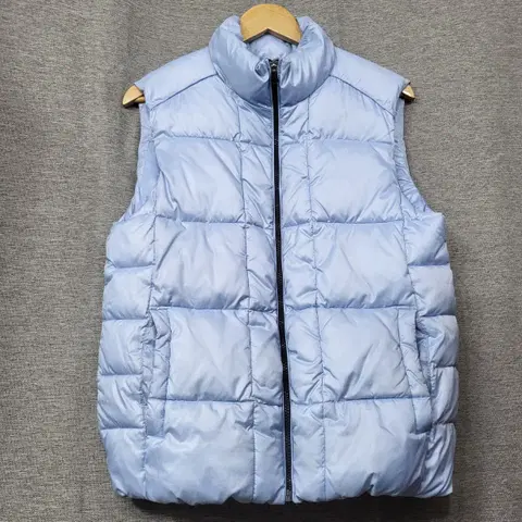 헤지스 하늘색 솜패딩 조끼