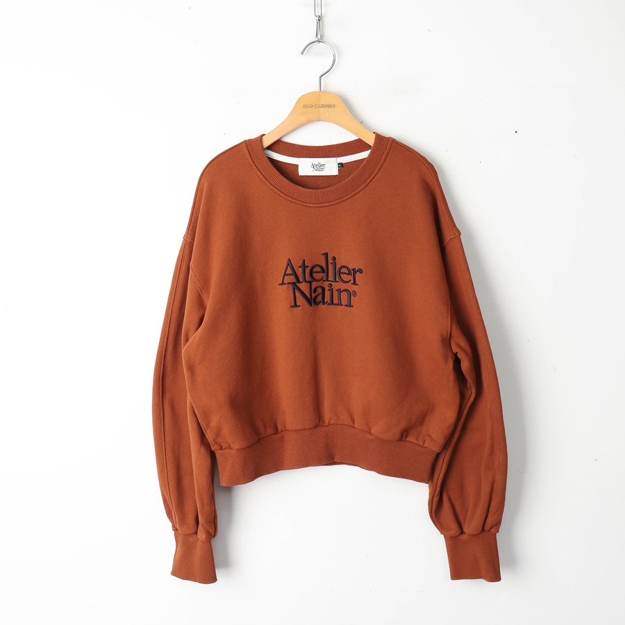 F/아틀리에 나인 그래픽 크롭 맨투맨