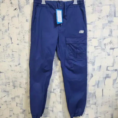 (새상품)스케쳐스 어패럴 카고 조거팬츠 L