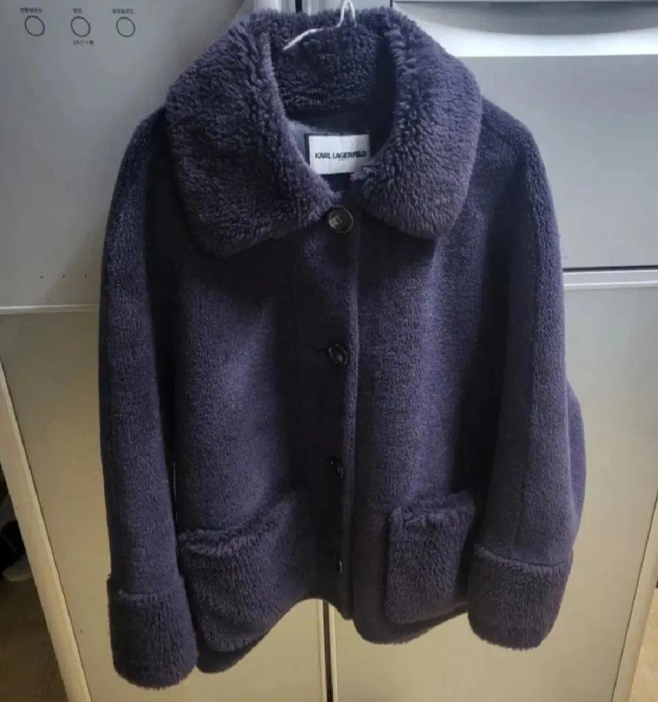 55 칼라거펠트 양모 무스탕