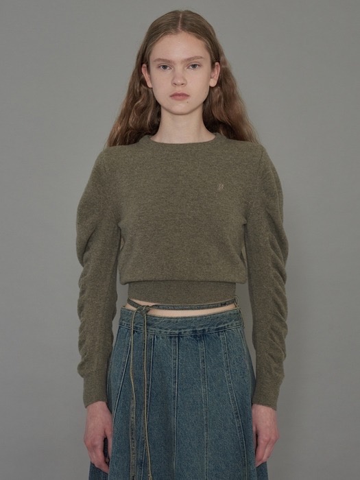 다이애그널 셔링 볼륨 슬리브 니트 탑 브라운