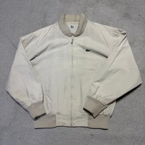 라코스테 아이보리 봄버 자켓